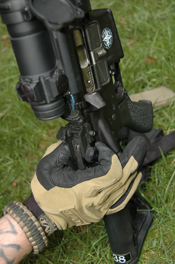 Grasp the charging handle