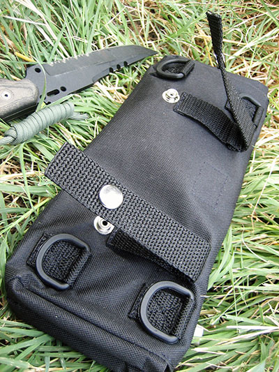 BOB has several options to attach it to a belt, other packs, or vehicles. Snap loops and heavy-duty plastic D-rings are featured on back of bag.