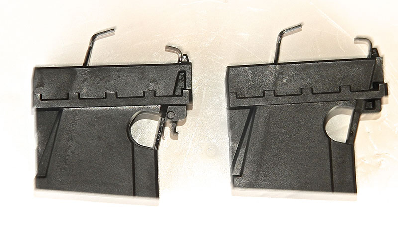Ruger mag well on left, Glock mag well on right. Visible hook on Ruger mag well enables SR series magazines, which unlatch from the front rather than the side, to be used