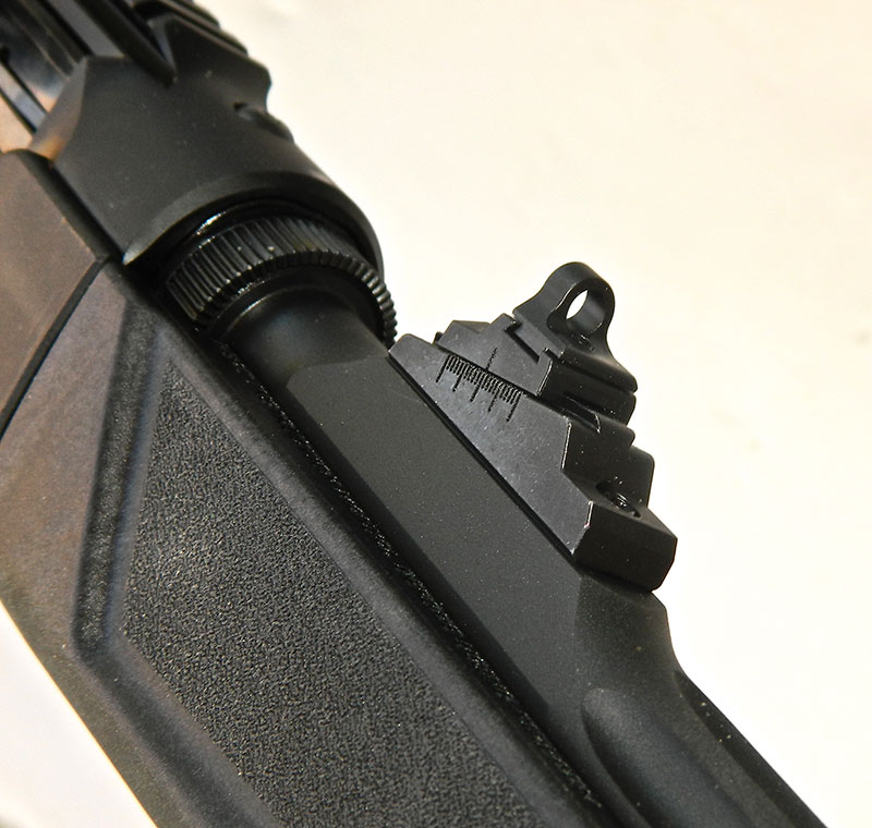 Ghost-ring rear sight is adjustable for windage and elevation.