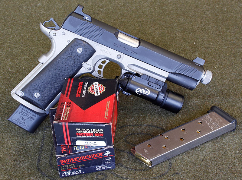 Colt Rail Gun, great mags, ammo, and light—solution to problems that happen at night.