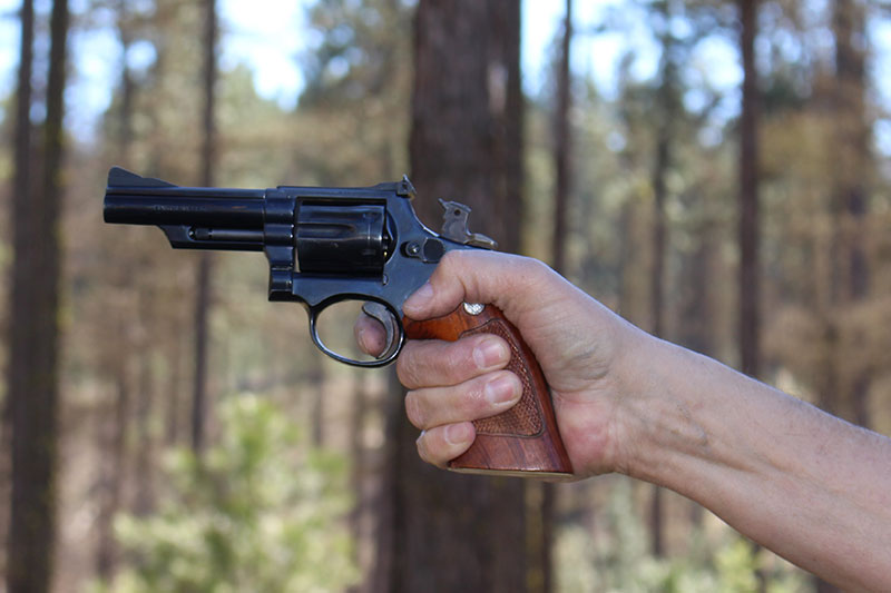 When shooting single-action, the pad of the finger is on the trigger.