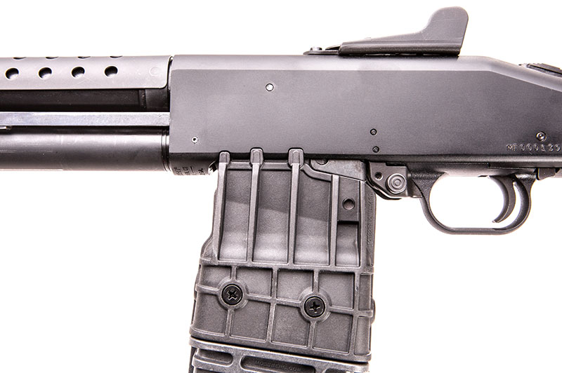 Notches on receiver perfectly mate up with lugs on magazines.