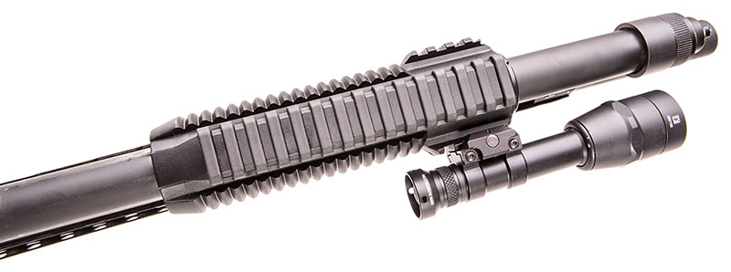 Rail on bottom of forend. Ladder-type <a href=