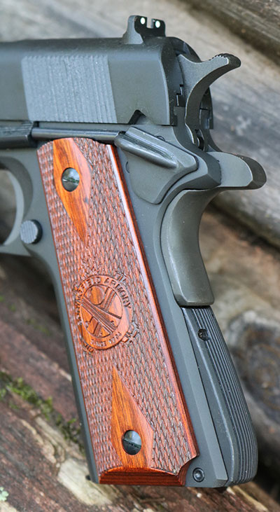 Mil-Spec sports left-sided GI safety as well as standard spur hammer. Arched mainspring housing is grooved like the originals.