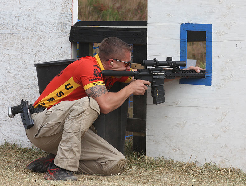 USMC Combat Shooting Team Marine maximizes points of contact while locking rifle into a corner of this shooting port, enabling rapid, precise hits at distance.