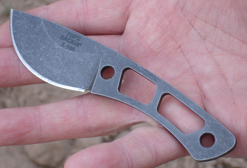 Backup is perfect companion to Hammer Hawk. Four-inch skeletonized knife has 2.38-inch upswept drop-point blade with substantial belly.