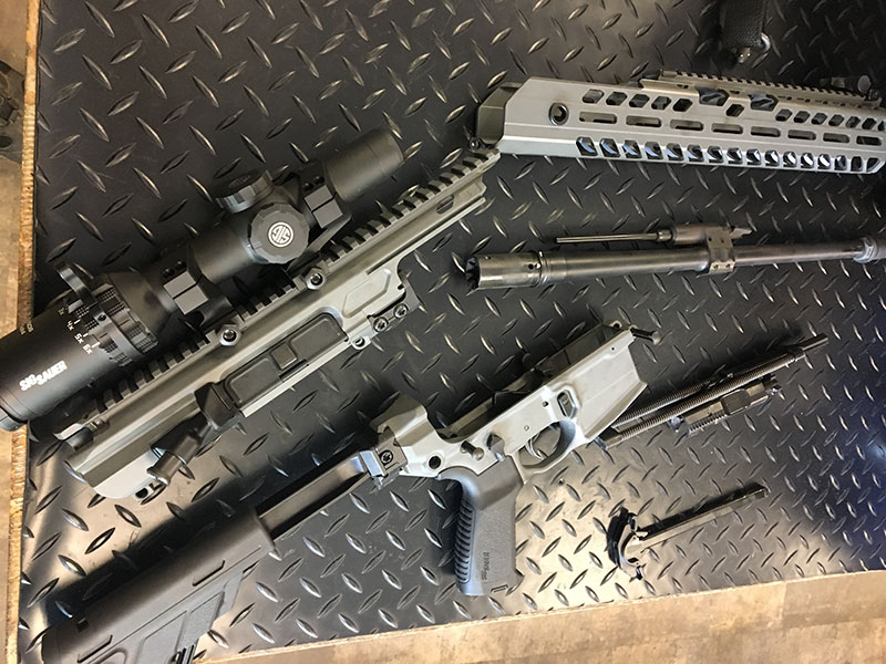 SIG MCX Virtus disassembled during barrel change procedure. Thousands of engineering hours were spent designing MCX’s ability to switch calibers/barrels without impacting reliability or accuracy. Two key elements of this were gas-port location and barrel interface with receiver.