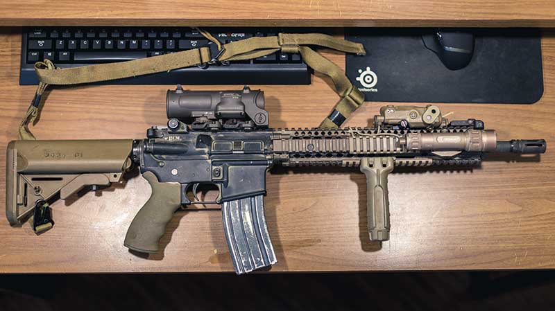 Two great examples of ARs outfitted to mimic military-issue carbines. 