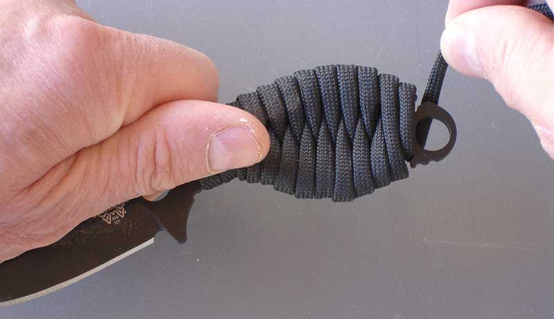 Follow-Up’s skeletonized handle features cleats that make it easy to paracord wrap the handle. Paracord is included with the knife.