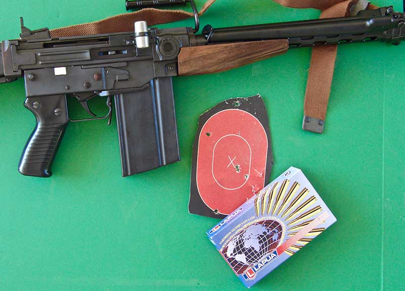 Three shots into .7 inch at 100 yards using 185-grain Scenar load in SIG AMT rifle.
