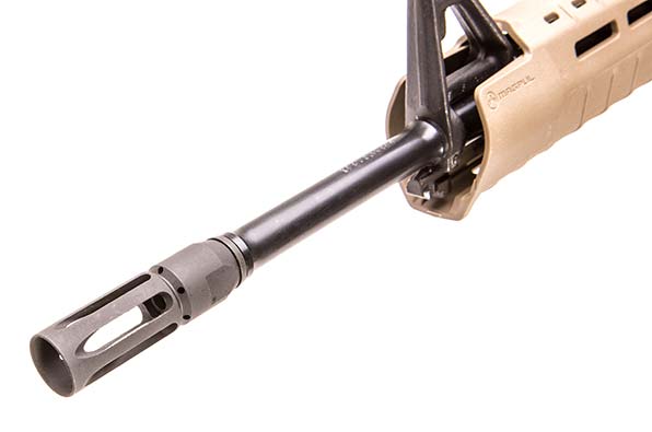 In addition to slots, patented S&W flash hider has vent holes built into its top to redirect gas up and out, helping reduce felt recoil and flash.