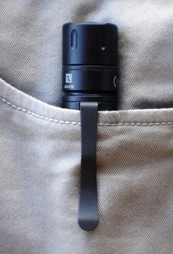Tactician is equipped with an extra-beefy pocket clip for bezel-up carry in pocket, pack, or purse. It can also be clipped on a hat brim for use as an expedient headlamp.