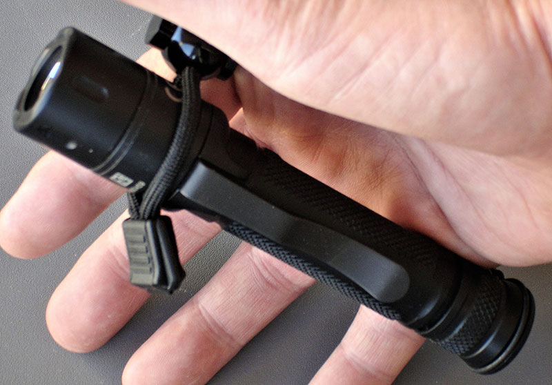 Tactician comes with SureFire Z33 Lanyard. Looping lanyard over bezel and back of hand allows you to maintain control of flashlight while performing other tasks with the hand.