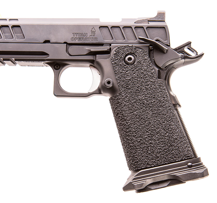 Safety, slide lock lever, and mag release are in the usual locations as found on a 1911.
