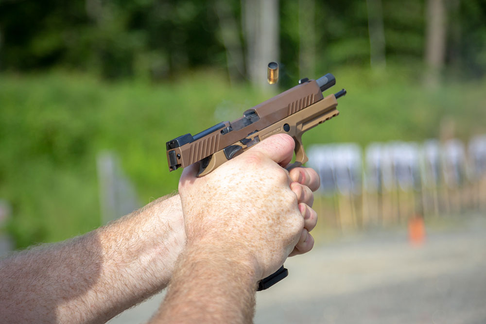 SIG P320-M17’s striker-fired design is conducive to rapid controlled fire, with empty case in the air exhibiting minimal muzzle flip.