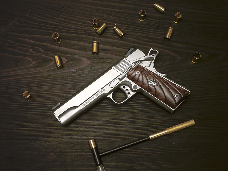 Cabot’s “entry level” 1911. Completely crafted of billet forged stainless steel, pistol sports exotic walnut scalloped Fibonacci grip panels. Magazine release is slightly oversized. Star trigger is fully adjustable for overtravel.