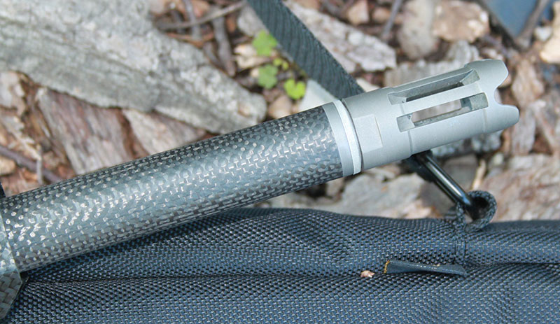 Titanium flash hider fits almost seamlessly at end of Christensen’s carbon-wrapped barrel, giving Christensen rifle very distinctive aesthetics.