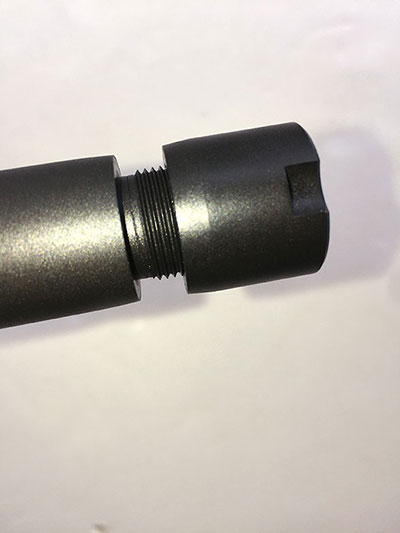 Muzzle is thread for flash hider, suppressor, or other muzzle device. Cap is included to protect the threads.