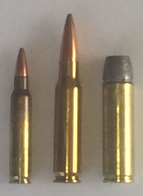 Six rounds from 75 yards prone. Author called “flyer” at three o’clock.