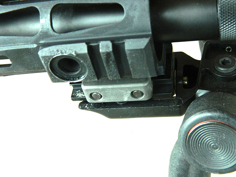 Short rail segments at three, six, and nine o’clock at muzzle end of handguard can be used to attach lights, lasers, bipod, etc.