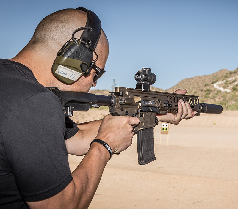 Will Milazzo of POF-USA fires P415 Edge Pistol with Dead Air Armament Sandman-K suppressor at Rio Salado Sportsmans Club in Mesa, Arizona during author’s evaluation. P415 was tested both with and without suppressor.