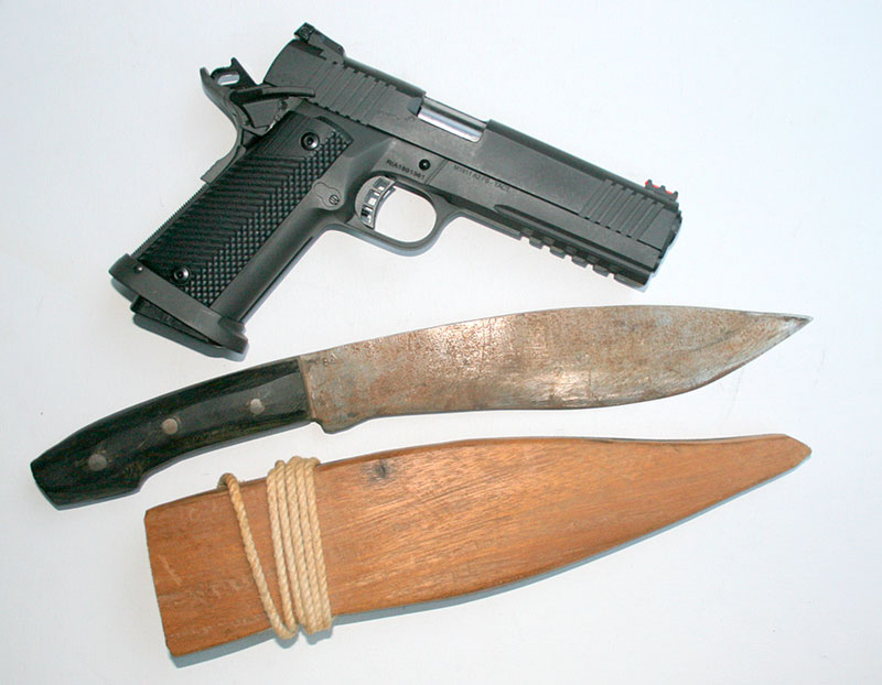Tac Ultra FS HC pistol with author’s bolo knife. Made by a Negrito at a Philippine Jungle Survival School from auto leaf spring, author used it in Vietnam.