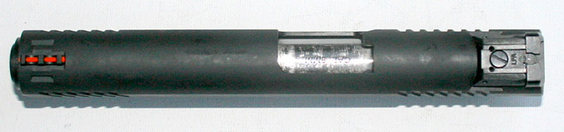 TUFSHC slide’s dorsal surface features fiber-optic front sight and fully adjustable rear. Ejection port is lowered and flared for positive ejection.
