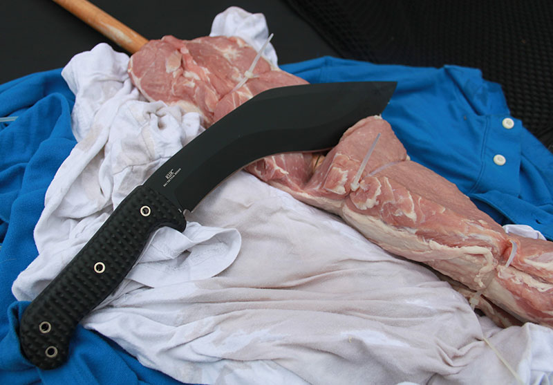 KUK cleaved through multiple layers and cut into wood handle.