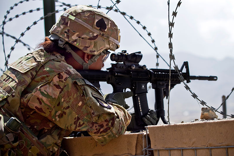 Member of 4th Bde. Combat Team, 101st Airborne Division firing issue M4 with ACOG mounted. Photo: U.S. Army