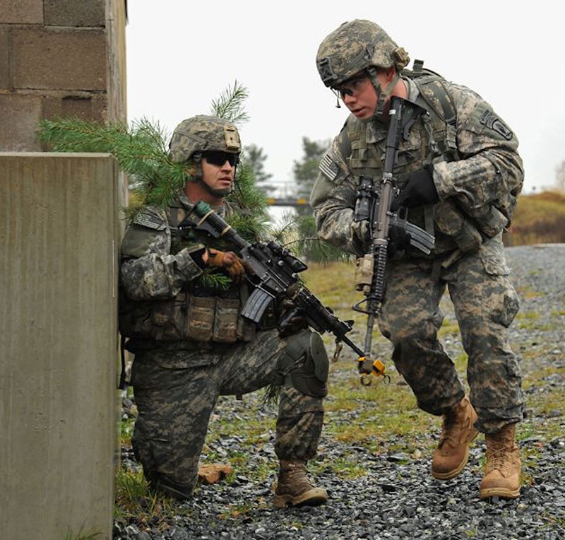 Members of 173rd Airborne with M4s mounting Trijicon ACOGs. Photo: U.S. Army