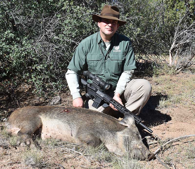 Brandon Trevino with feral boar taken with Ruger AR-556 MPR in .450 Bushmaster.