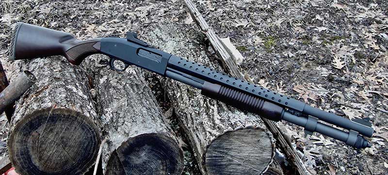 Walnut furniture on Mossberg 590A1 Retro harkens back to military trench shotguns of World Wars I and II.