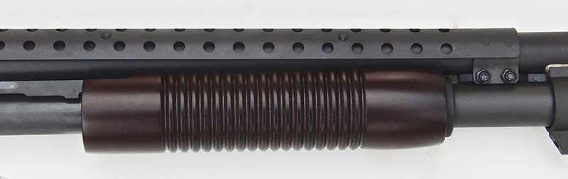 Grooves on forearm facilitate sure grip when operating the action.