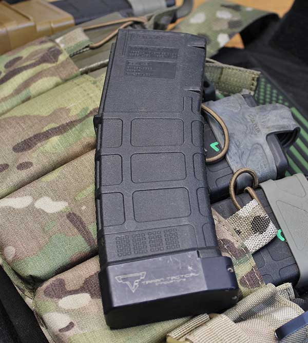 Taran Tactical Innovations Magazine Extension adds five rounds to standard PMAG and six rounds to 40-round PMAG.
