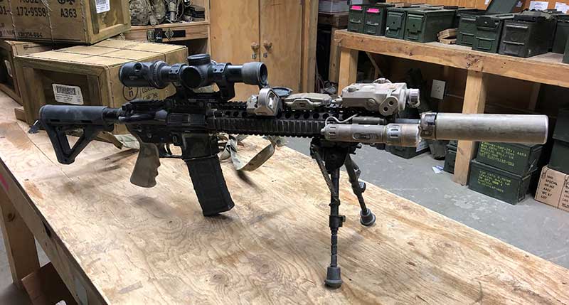 Suppressed M4A1 sports Vortex LPVO, EOTech MRDS, LA-5 laser, and Insight white light. With bipod, this set-up gives user best chance of hitting targets at extended ranges, while offset red dot makes carbine practical for use against close-range threats.
