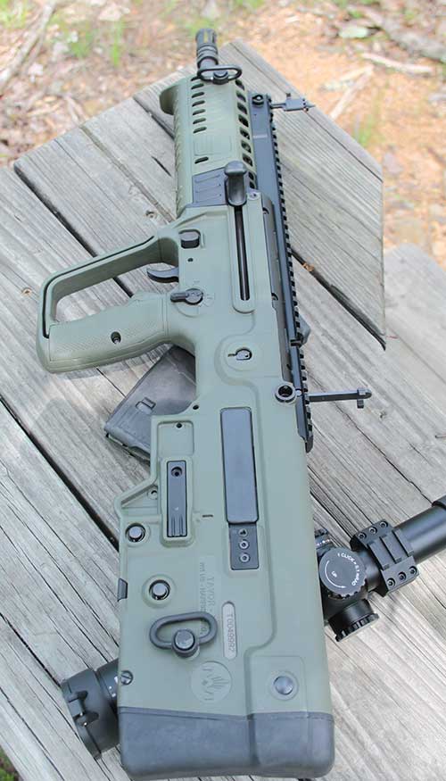 Tavor X95 comes with functional BUIS that fold down into top Picatinny rail, which cries out for a red dot or magnified optic.
