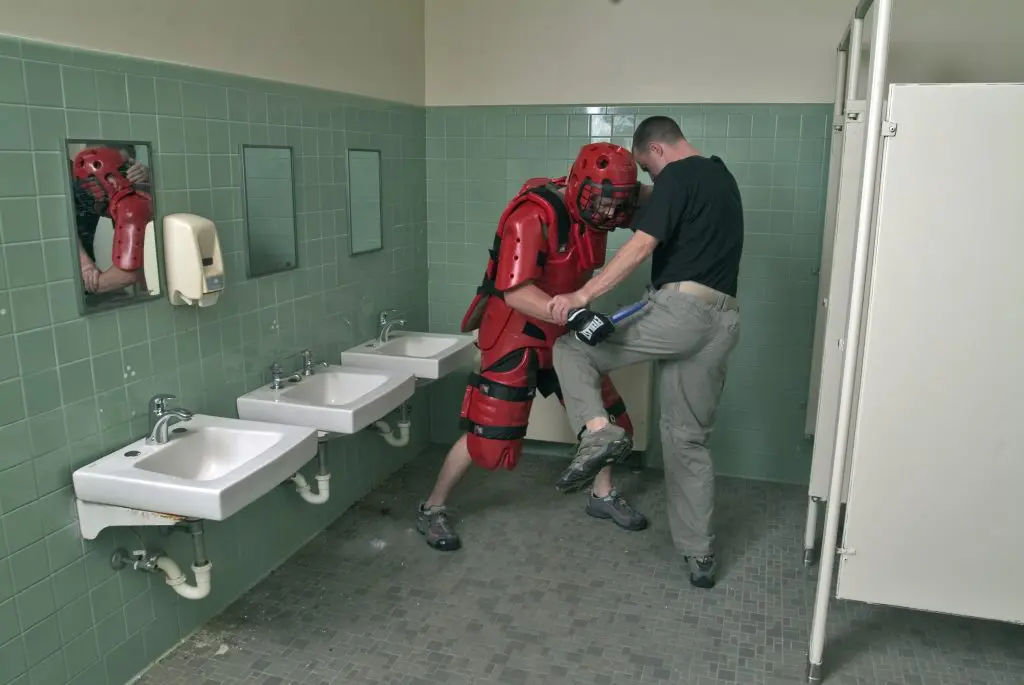 two men doing self-defense knife training