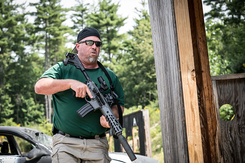 On the move to get into position to engage next set of targets at SIG Sauer Academy’s Hogan’s Alley range.