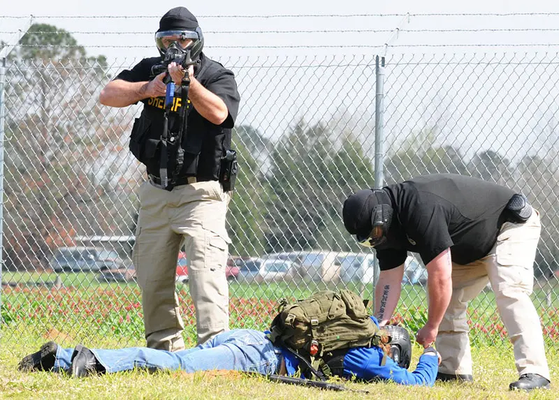 Members of Coffee County (Alabama) Sheriff's Department apprehend “suspect” during active-shooter exercise conducted at Lucas Stagefield. In active-shooter or terrorist event, EMS won’t render aid until scene has been secured. Photo: U.S. Army by Nathan Pfau