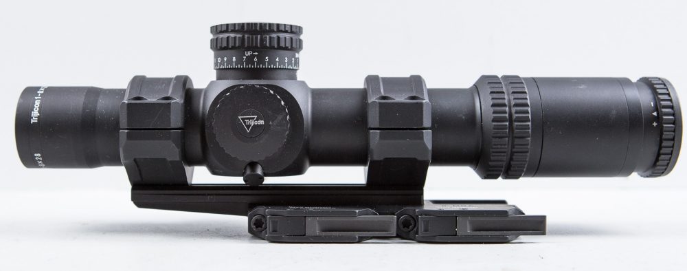 Magnification dial is visible on left side of Trijicon 1-8X28 Accupower.