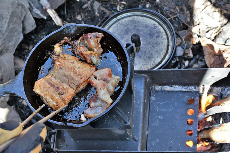 Minuteman puts out a lot of heat in a very small area. Cast iron works incredibly well with the stove. While this may limit portability even more, it adds to stove’s overall efficiency and safety.