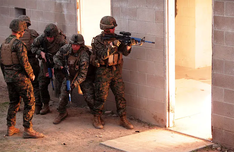 Marines with 2nd Battalion, 1st Marines prepare to clear building after throwing flashbang at Camp Pendleton, California in 2014. Photo: U.S. Marine Corps photo by Lance Cpl. Joshua Murray / Released