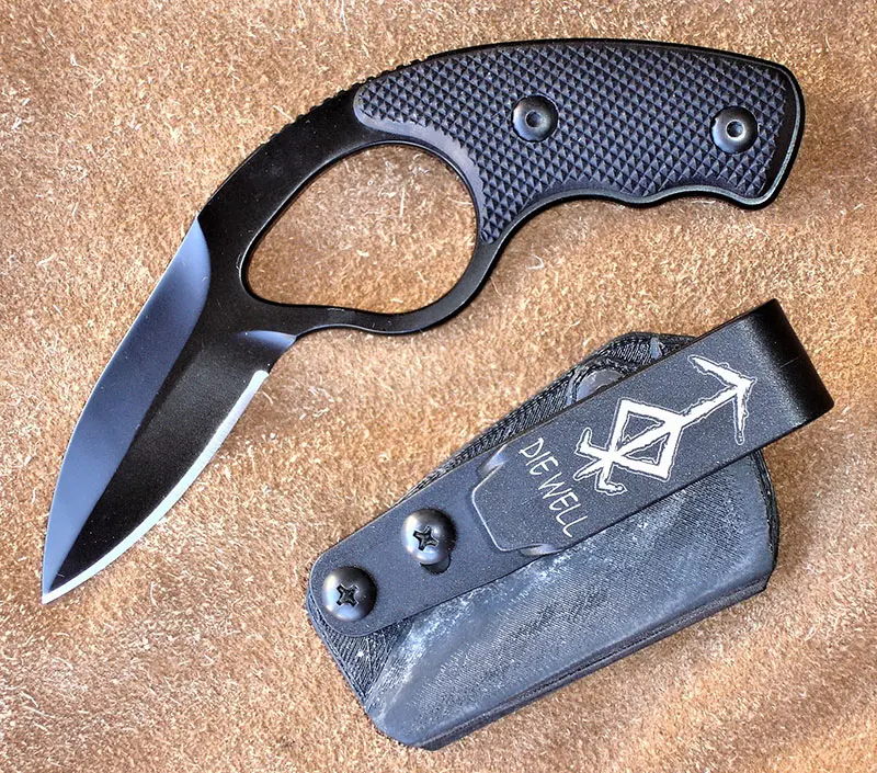 NoVz from Colonel Blades features shortened grip for additional concealability. Kydex sheath (shown) is optional. Injection-molded sheath is standard.