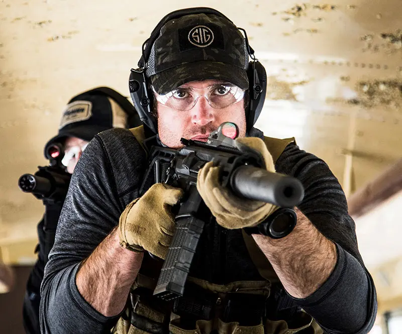 Individuals with suppressed MCX Rattler SBRs during tubular assault training. MCX Rattler is ideal for fast-moving operators in close quarters.