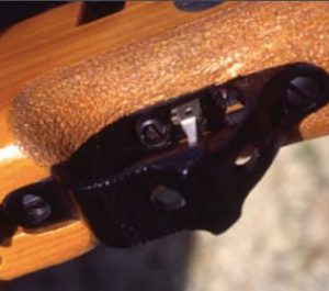 Note trigger adjustment screw in front of trigger and shape of trigger guard, which will allow it to rest on the palm quite comfortably. 