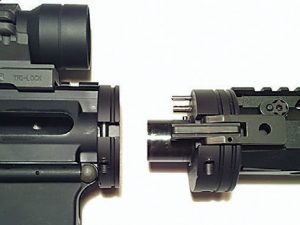 Basic QRB components on AR-15 upper separated for storage