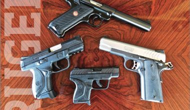 Clockwise from top: Ruger Mark IV, SR1911 Lightweight Commander, LCP II, American Compact.