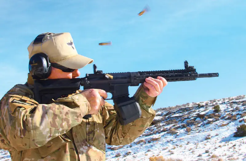 Jim Carroll puts .223 rounds through QRB using select-fire lower at his range. There were no malfunctions throughout the tests.