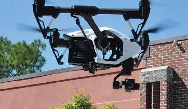 About-seven-feet-off-the-deck,-DJI-Inspire-1-drone-slows-to-a-hover